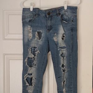 Ripped light blue jeans